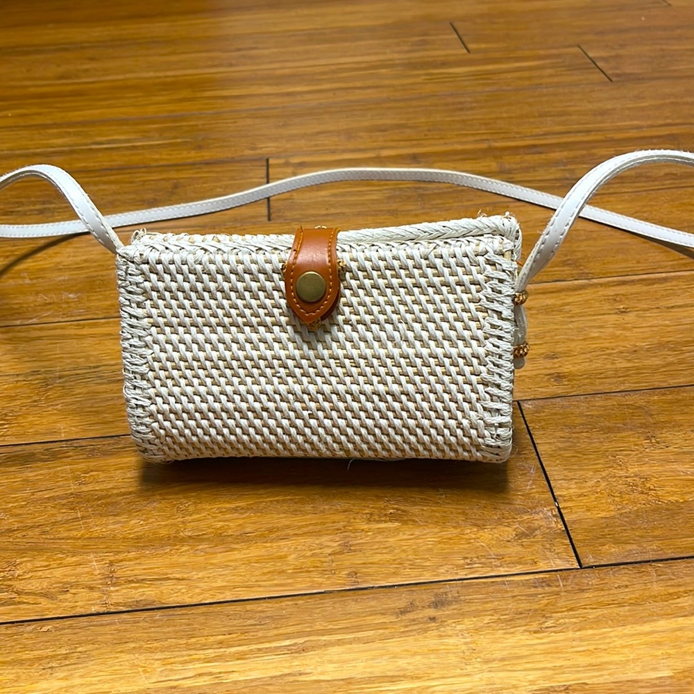 Anthropology white and tan wicker purse.